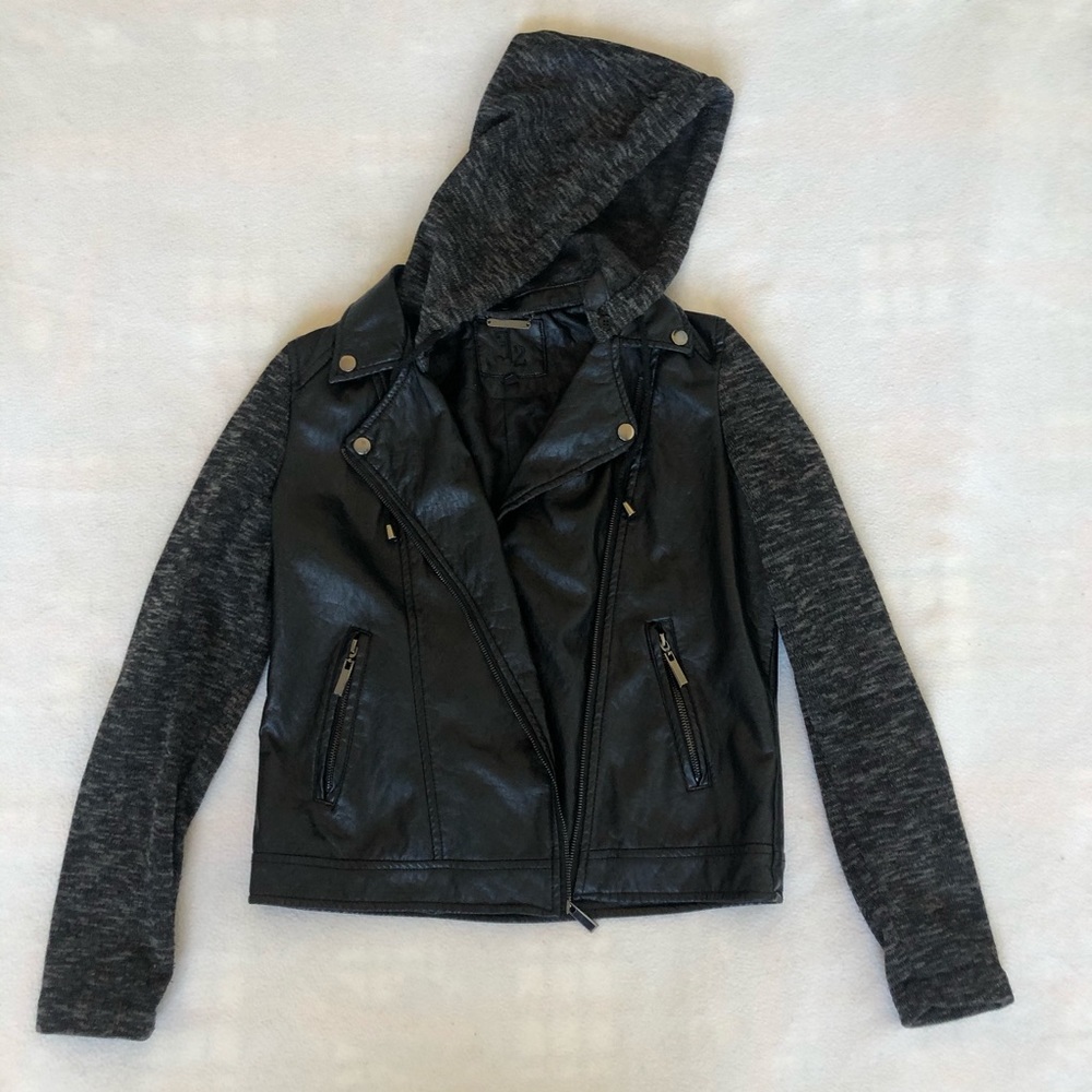 Leather vest with soft materials sleeves